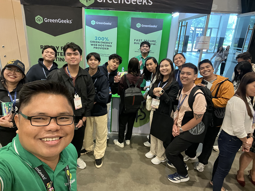 GreenGeeks Team and Attendees at the booth